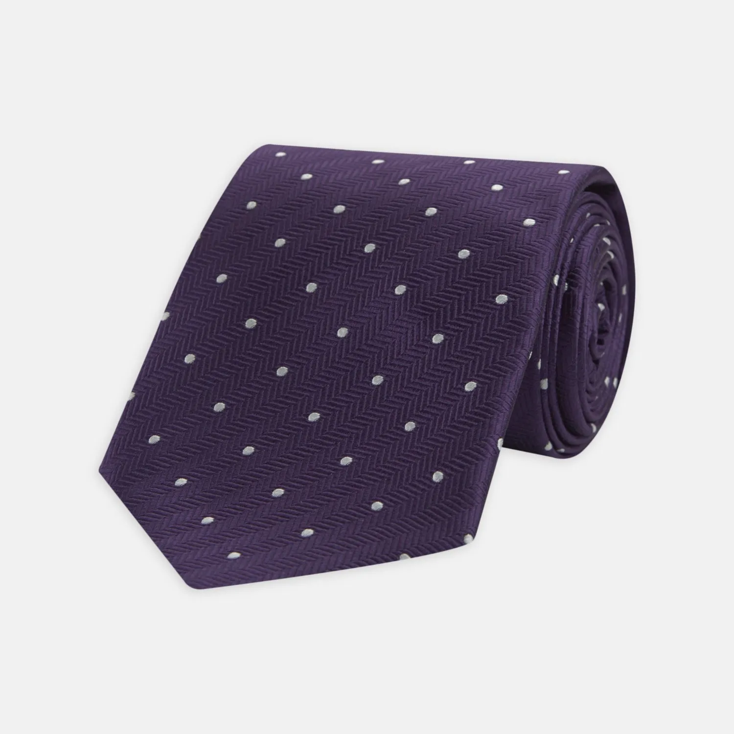 Plum and White Small Spot Herringbone Silk Tie sold by Turnbull & Asser