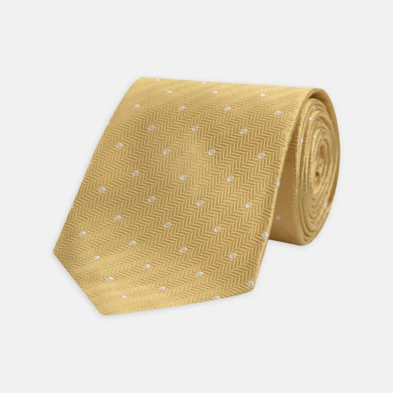 Gold and White Small Spot Herringbone Silk Tie sold by Turnbull & Asser