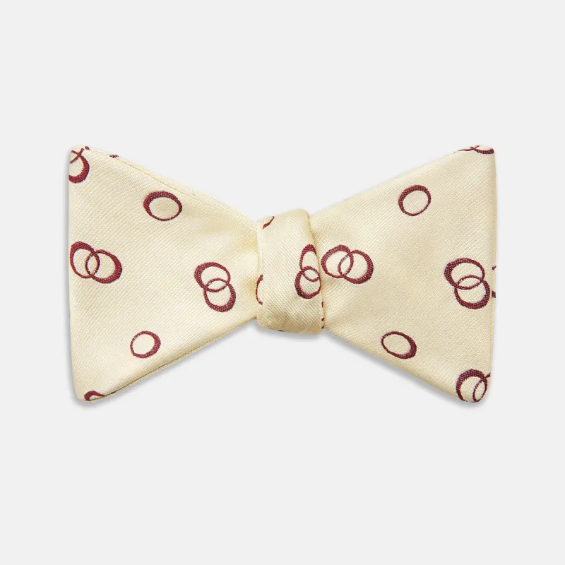 Yellow Geometric Rings Silk Bow Tie sold by Turnbull & Asser