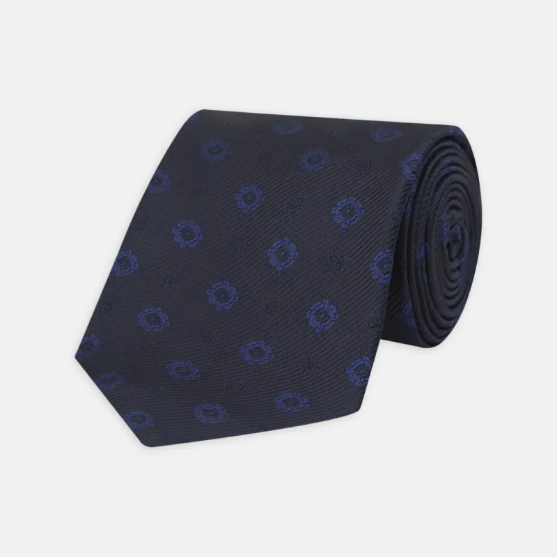 Navy and Blue Emblem Spot Silk Tie sold by Turnbull & Asser