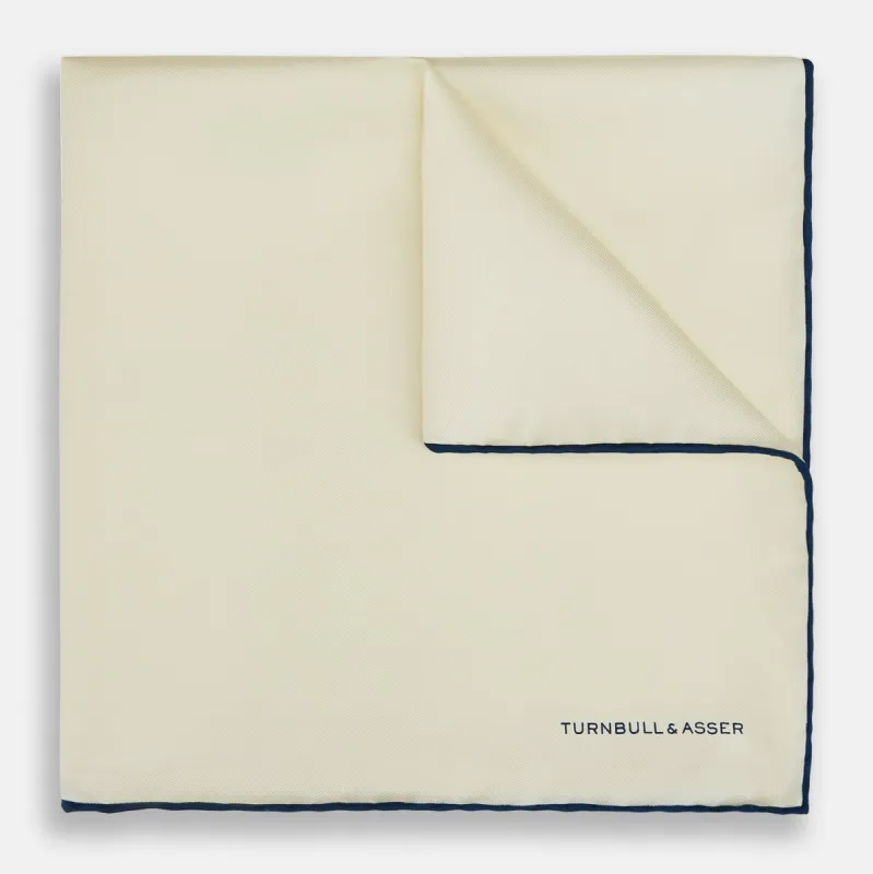 ECRU AND NAVY BLUE PIPED SILK POCKET SQUARE sold by Turnbull & Asser