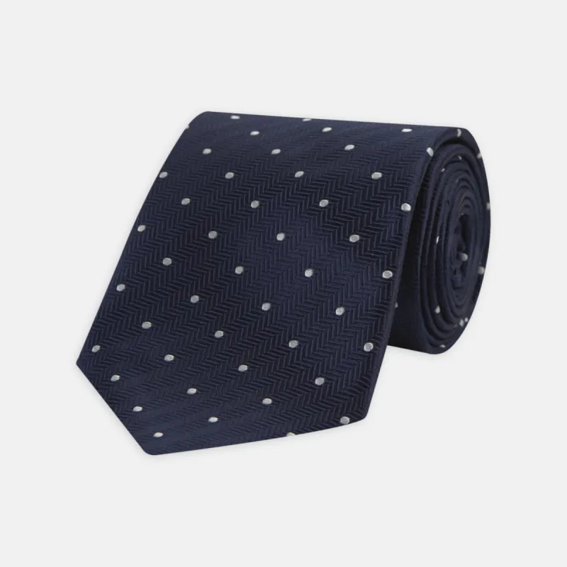 Navy and White Small Spot Herringbone Silk Tie sold by Turnbull & Asser