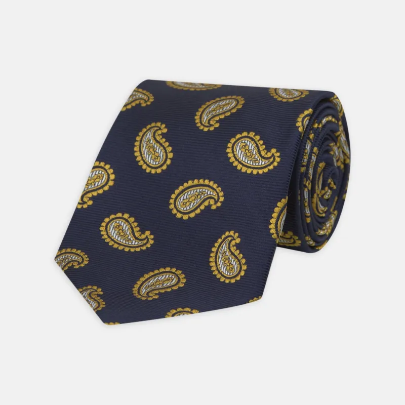 Navy and Gold Floating Paisley Silk Tie sold by Turnbull & Asser