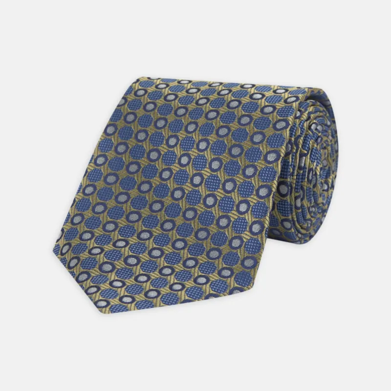 Gold and Blue Circle and Spot Silk Tie sold by Turnbull & Asser