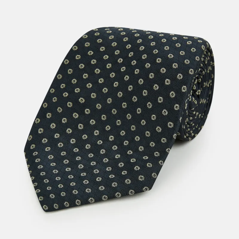 Navy and White Circle Silk Tie sold by Turnbull & Asser