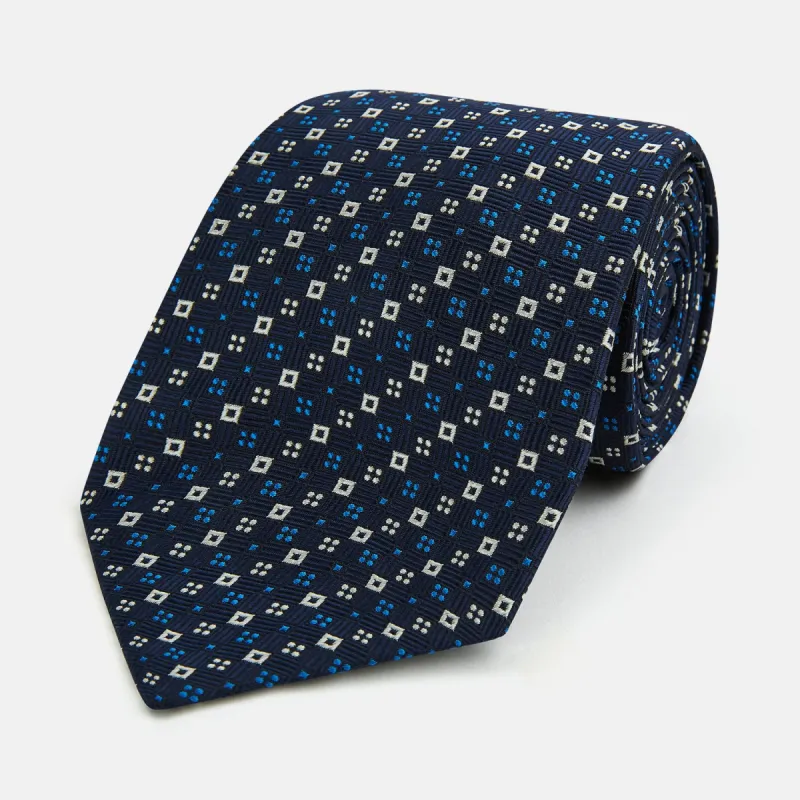 Blue and White Geometric Silk Tie sold by Turnbull & Asser