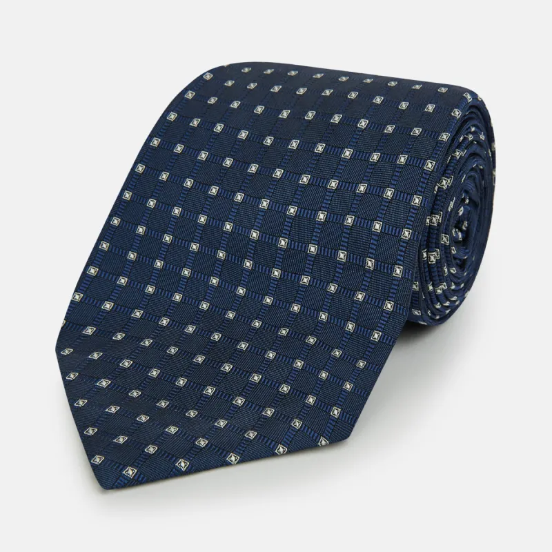 Navy and White Geometric Silk Tie sold by Turnbull & Asser