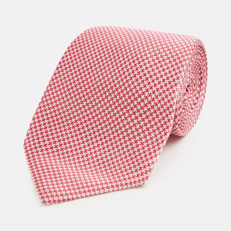 Pink and white Hounstooth Silk Tie sold by Turnbull & Asser