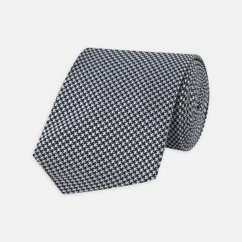 White and black houndstooth Woven Silk Tie sold by Turnbull & Asser
