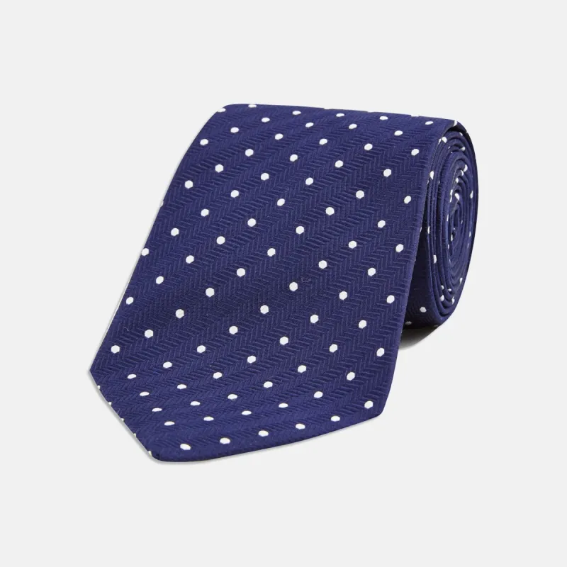 Navy and White Spot Woven Herringbone Silk Tie sold by Turnbull & Asser