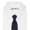 White and Navy Spot Printed Silk Tie sold by Turnbull & Asser