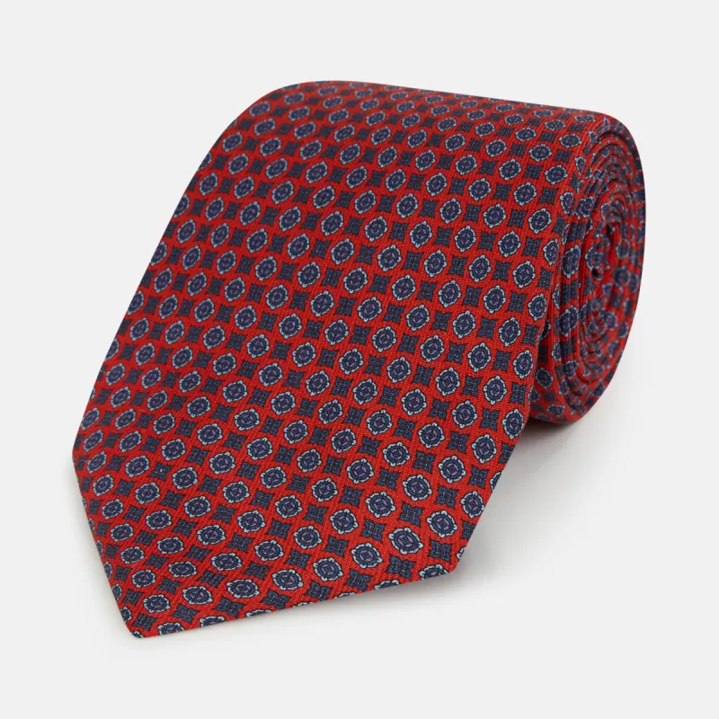 Red and Blue Geometric Floral Silk Tie sold by Turnbull & Asser