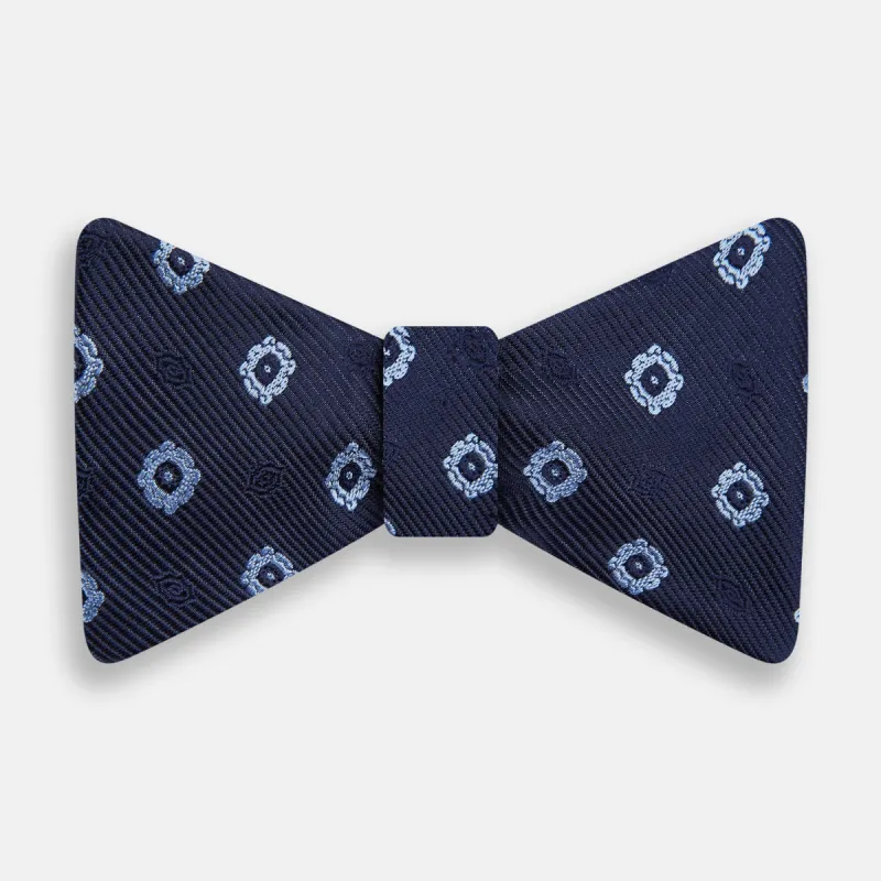 Navy and Sky Blue Motif Silk Bow Tie sold by Turnbull & Asser