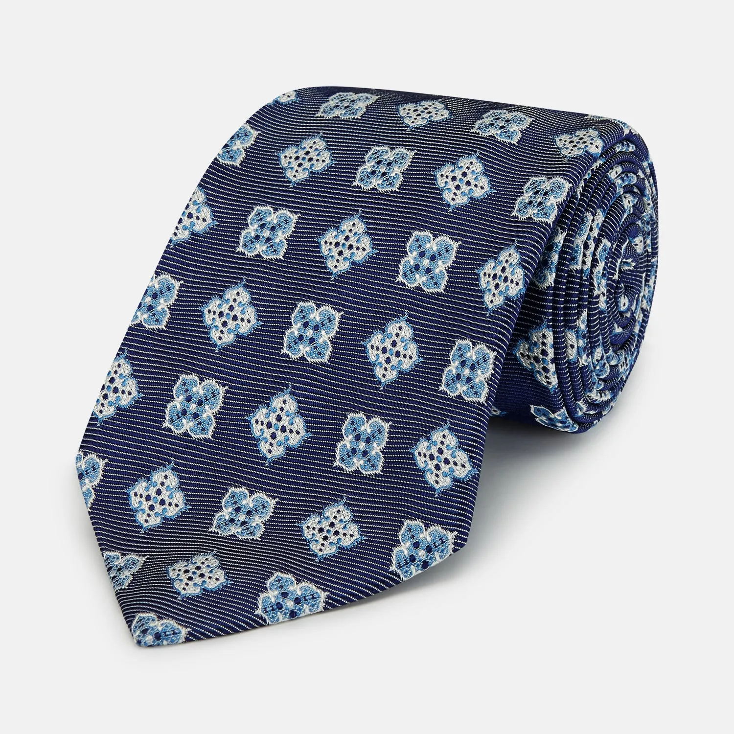 Blue Geometric Jacquard Tie sold by Turnbull & Asser