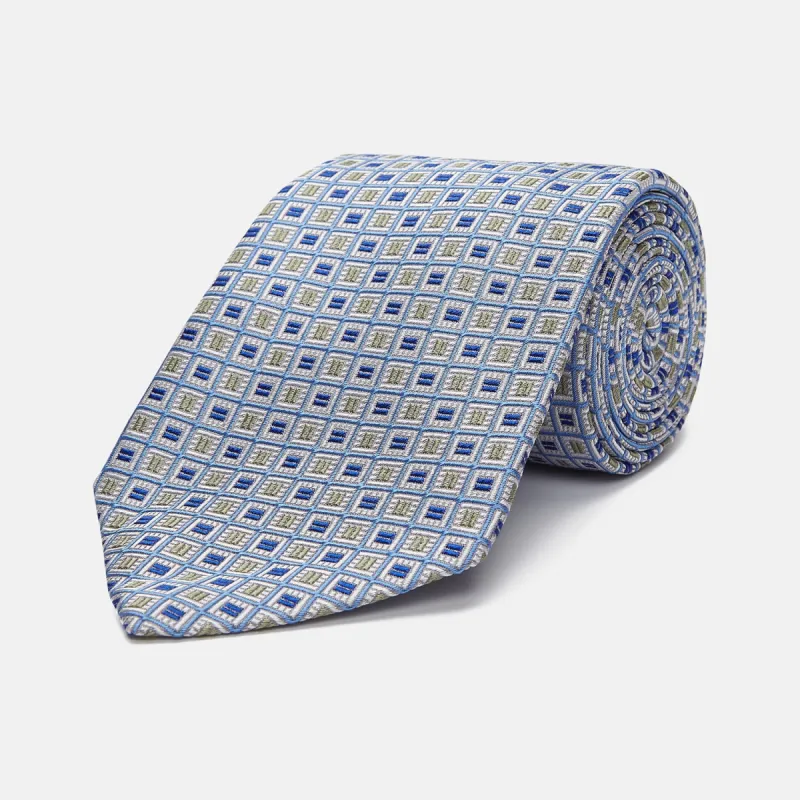 Blue and Yellow Geometric Silk Jacquard Tie sold by Turnbull & Asser