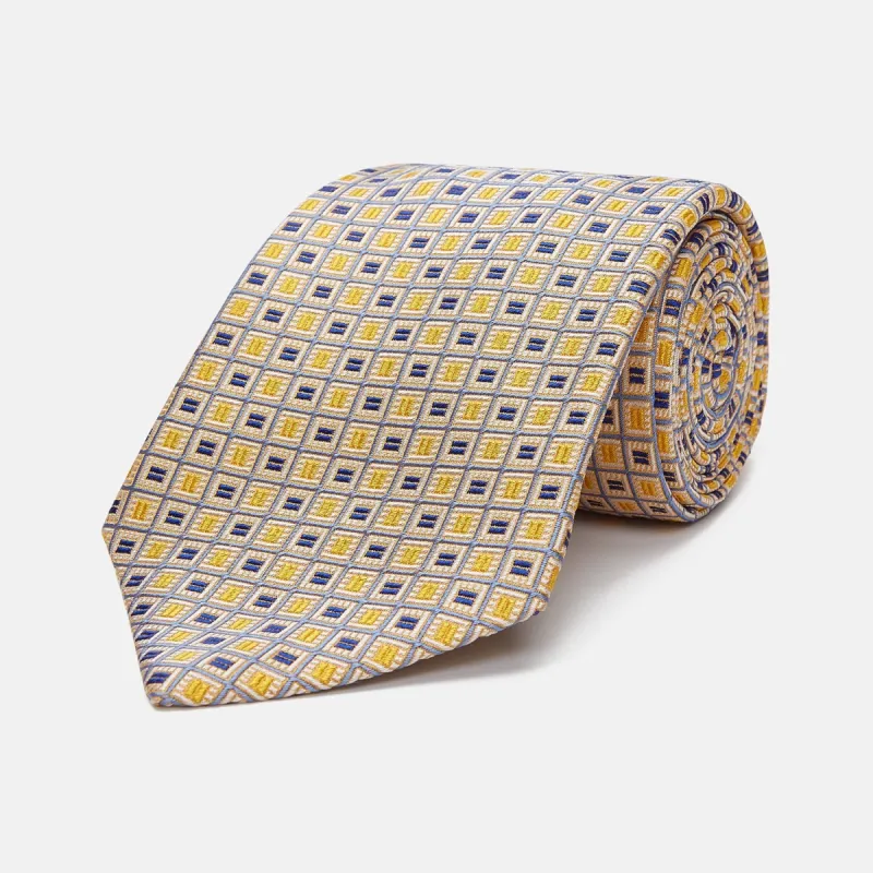 Yellow and Navy Geometric Silk Jacquard Tie sold by Turnbull & Asser