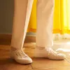 White Cotton Pleated Trousers sold by Turnbull & Asser