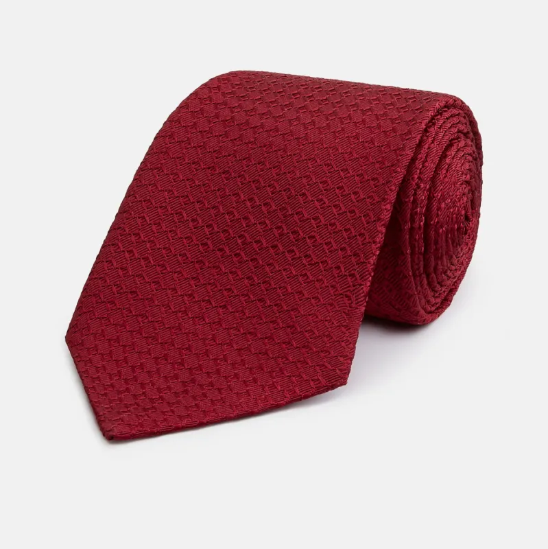 Burgundy Abstract Tonal Silk Jacquard Tie sold by Turnbull & Asser