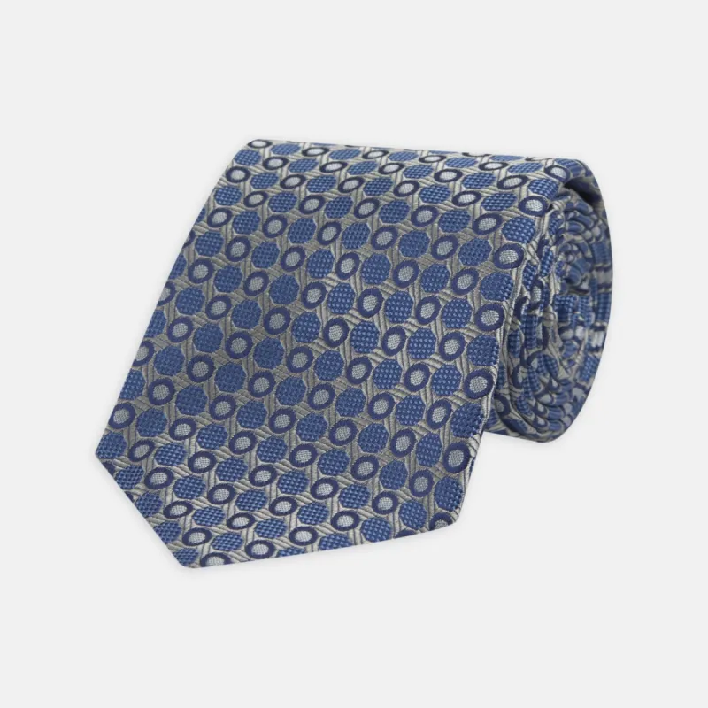 Silver and Blue Circle and Spot Silk Tie sold by Turnbull & Asser
