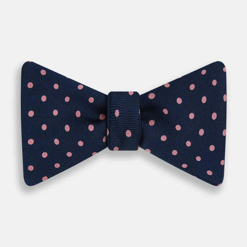 Navy and Pink Spot Silk Bow Tie sold by Turnbull & Asser