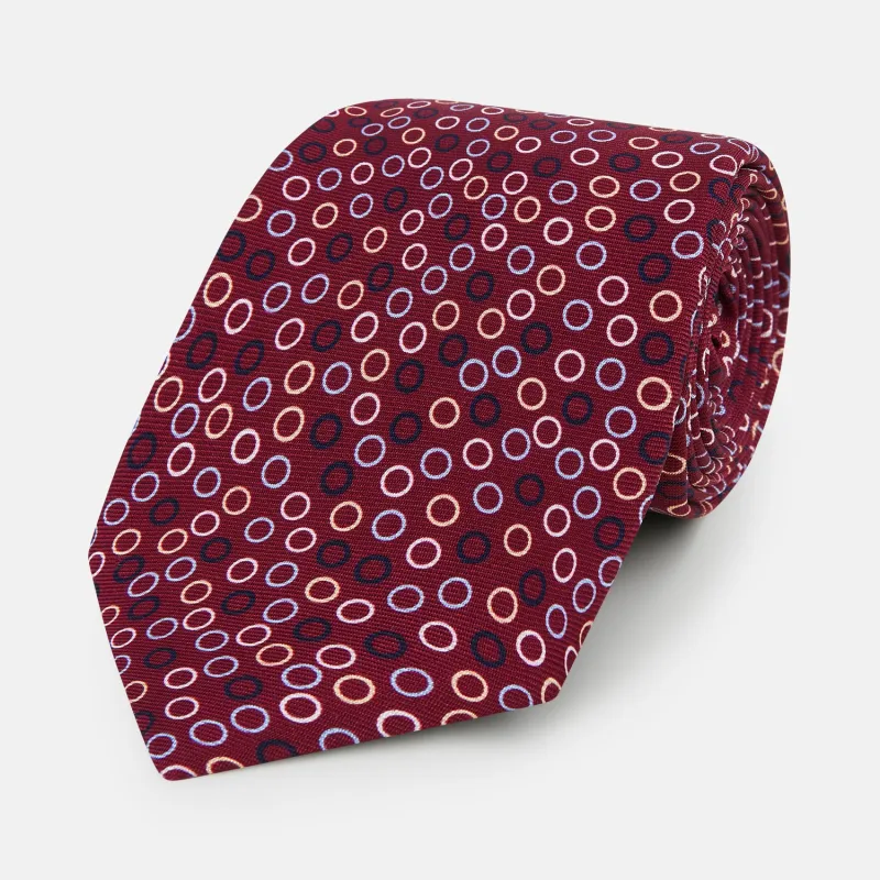 Pink and Navy Circle Burgundy Silk Tie sold by Turnbull & Asser