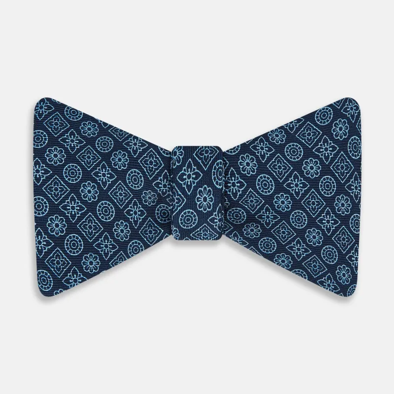 Dark Navy Floral Tile Pattern Printed Silk Bow Tie sold by Turnbull & Asser