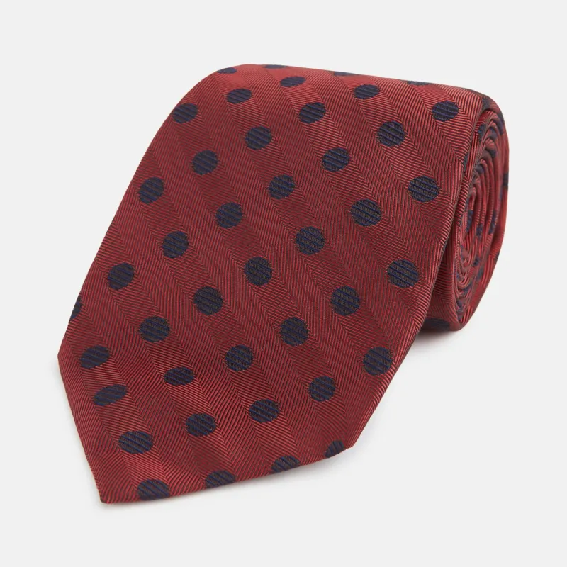Navy Dot and Red Silk Tie sold by Turnbull & Asser