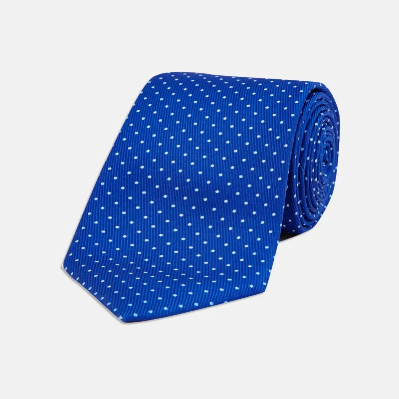 Slim Royal Blue and White Small Spot Printed Silk Tie sold by Turnbull & Asser