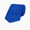 Slim Royal Blue and White Small Spot Printed Silk Tie sold by Turnbull & Asser