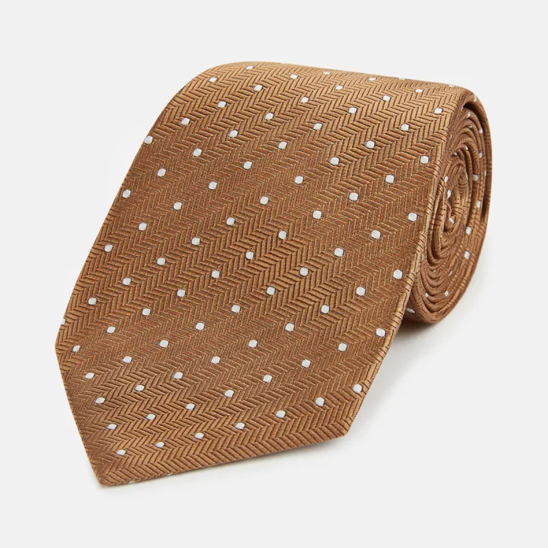 Camel and White Small Spot Herringbone Silk Tie sold by Turnbull & Asser