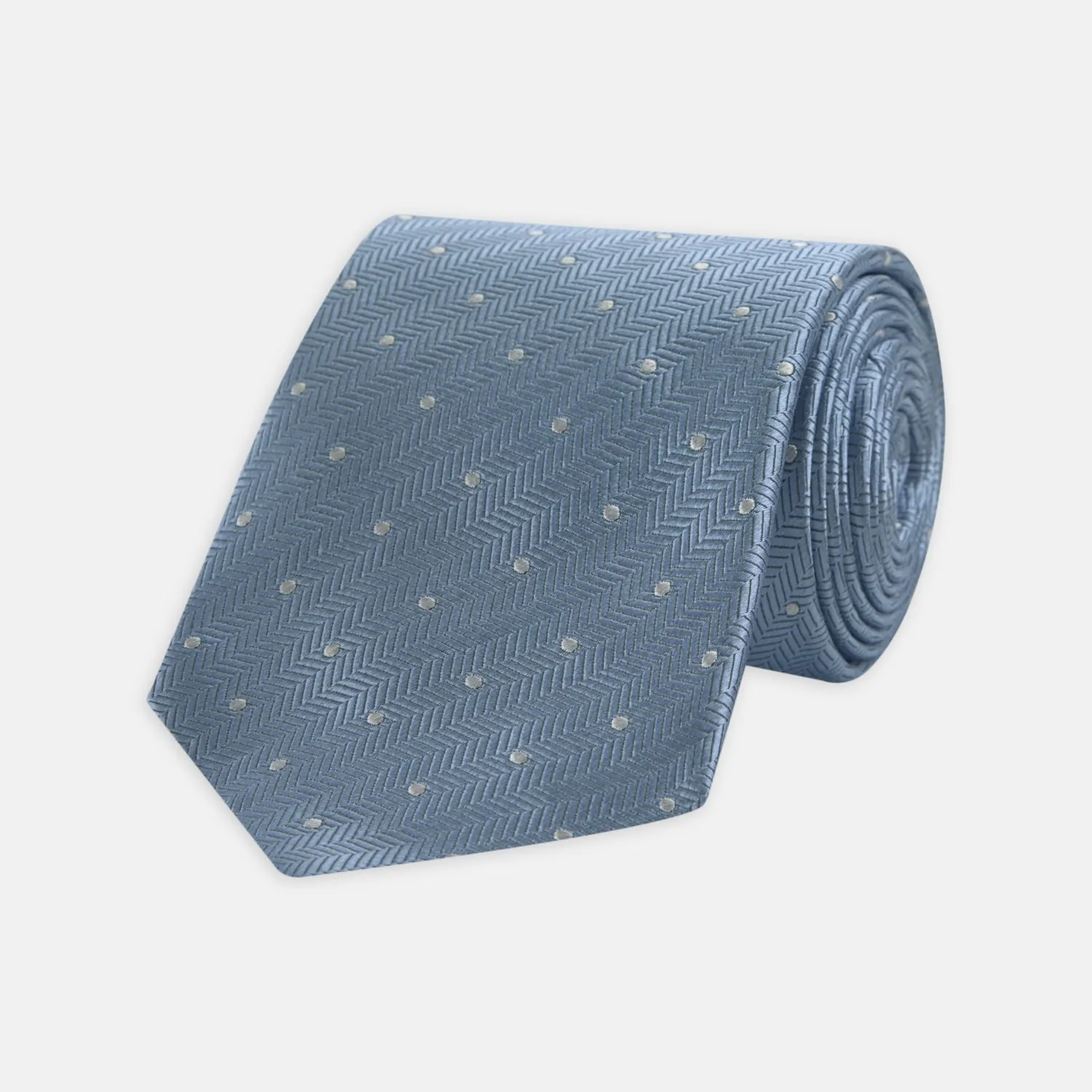 Ice Blue and White Small Spot Herringbone Silk Tie sold by Turnbull & Asser