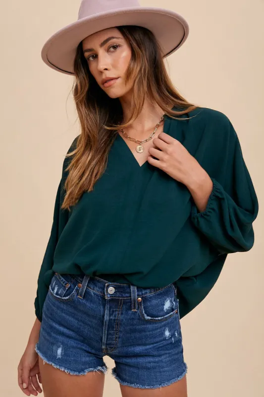 Loose fit wide fold placket woven blouse top sold by U-NI-TY