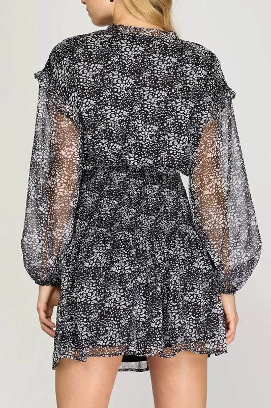 Ruffled Smocked Mini Dress sold by U-NI-TY