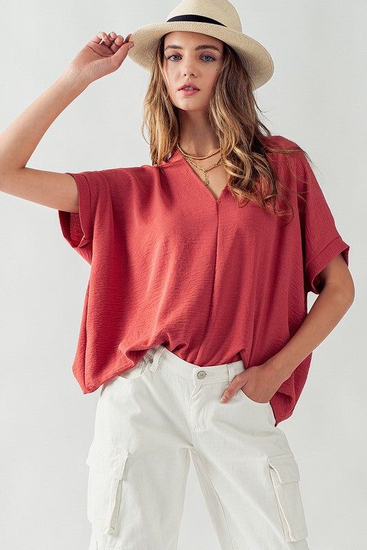 Oversized V Neck Folded Short Sleeve Top sold by U-NI-TY