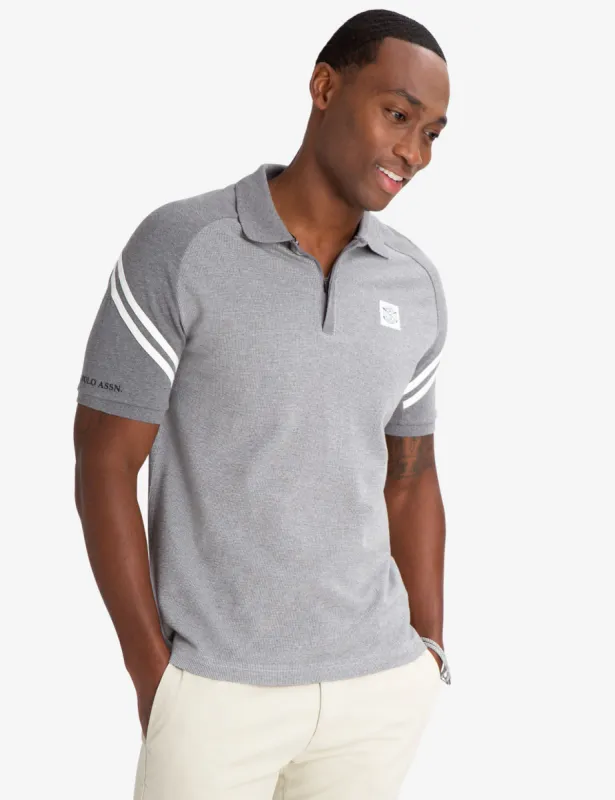 BLACK MALLET SLIM FIT JACQUARD ZIPPER POLO SHIRT sold by U.S. Polo Assn.