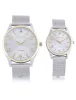 HIS AND HERS SILVER & GOLD MESH WATCH SET sold by U.S. Polo Assn.