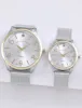 HIS AND HERS SILVER & GOLD MESH WATCH SET sold by U.S. Polo Assn.
