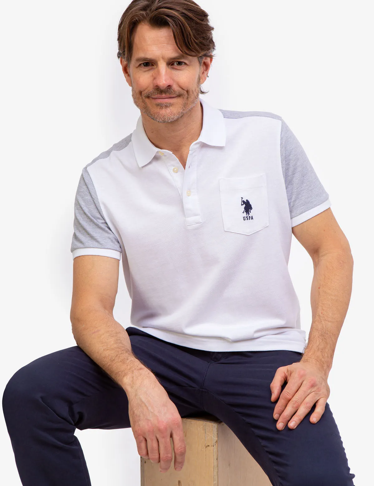 COLORBLOCK PIQUE POLO SHIRT WITH POCKET sold by U.S. Polo Assn.