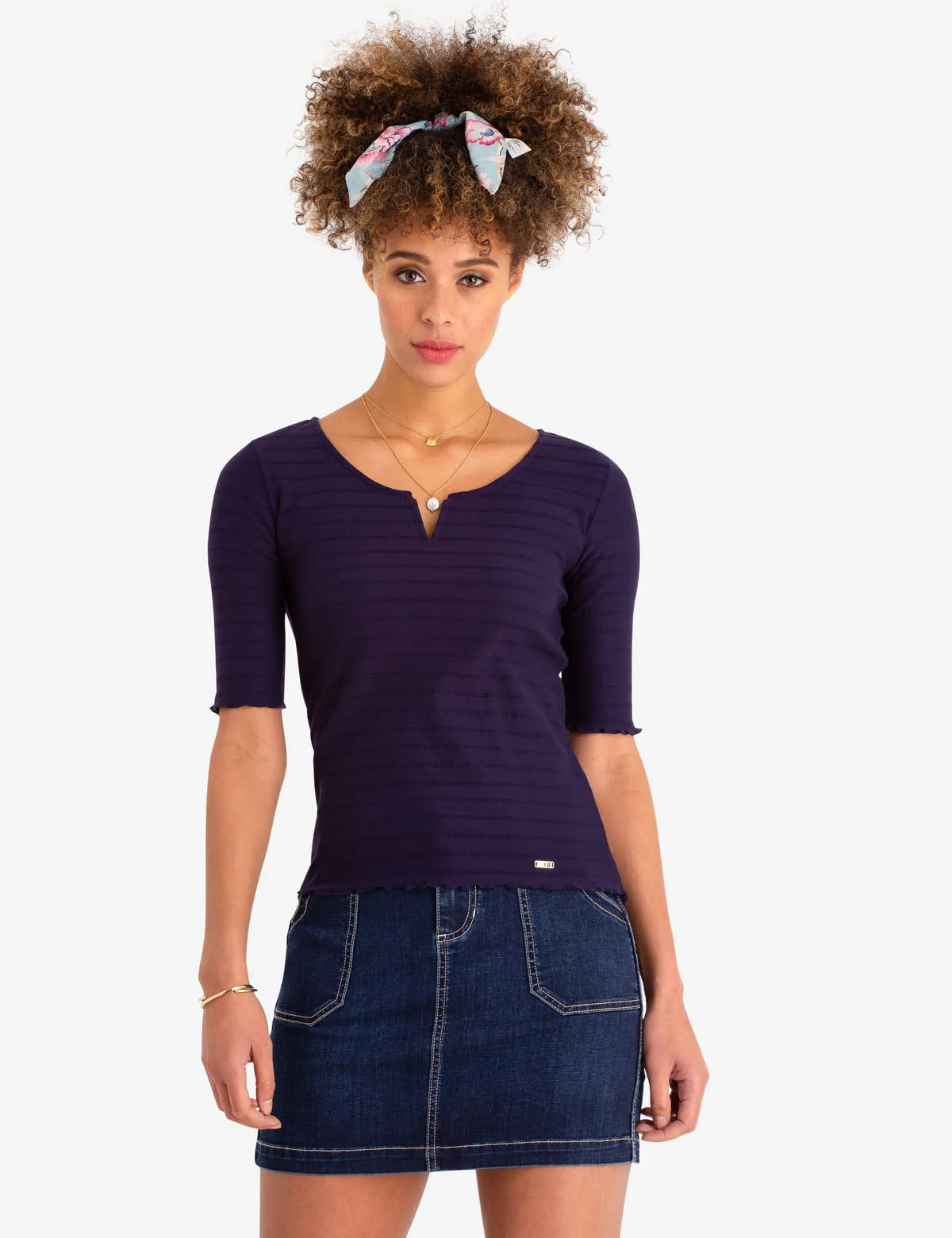 RUFFLE HEM V-NECK TOP sold by U.S. Polo Assn.