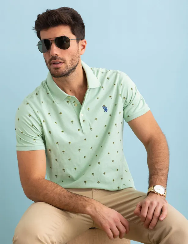 ALL OVER PALM PRINT JERSEY POLO SHIRT sold by U.S. Polo Assn.