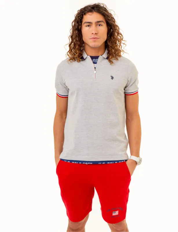 RED WHITE AND BLUE ZIPPER PIQUE POLO SHIRT made by U.S. Polo Assn.