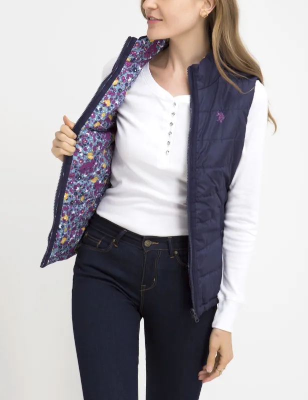 REVERSIBLE FLORAL VEST sold by U.S. Polo Assn.