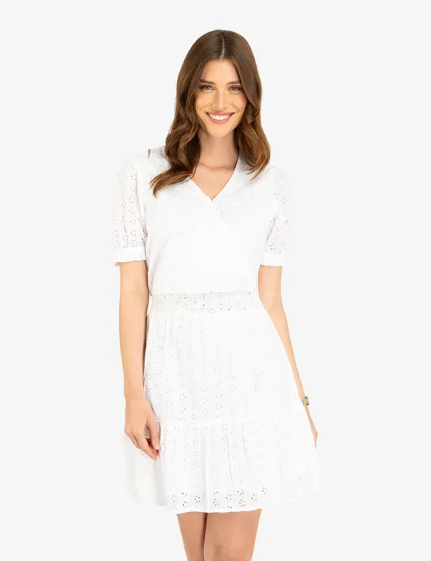 SHORT SLEEVE EYELET RUFFLE DRESS sold by U.S. Polo Assn.