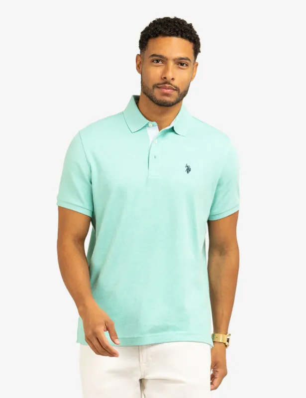 SOLID INTERLOCK POLO SHIRT WITH WOVEN TRIM sold by U.S. Polo Assn.