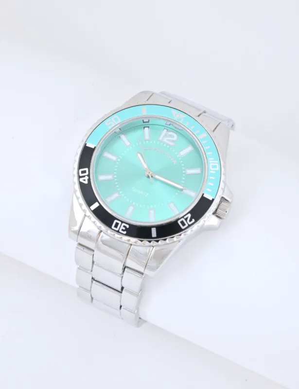 MEN'S SILVERTONE W TEAL ANALOG WATCH sold by U.S. Polo Assn.