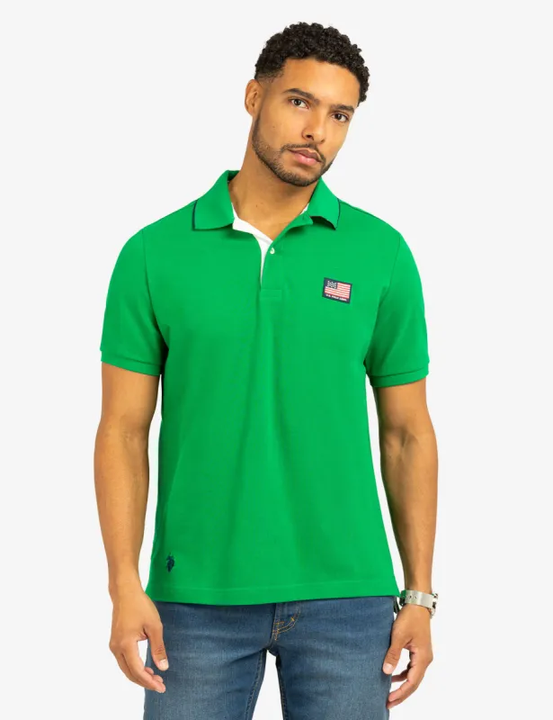 FLAG PIQUE POLO SHIRT WITH UNDER COLLAR DETAIL sold by U.S. Polo Assn.