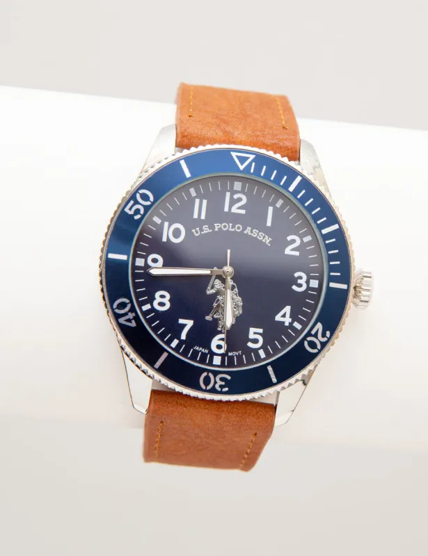 MEN'S BROWN STRAP WATCH WITH BLUE SPORT BEZEL sold by U.S. Polo Assn.