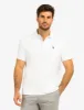 SOLID INTERLOCK POLO SHIRT WITH WOVEN TRIM sold by U.S. Polo Assn.