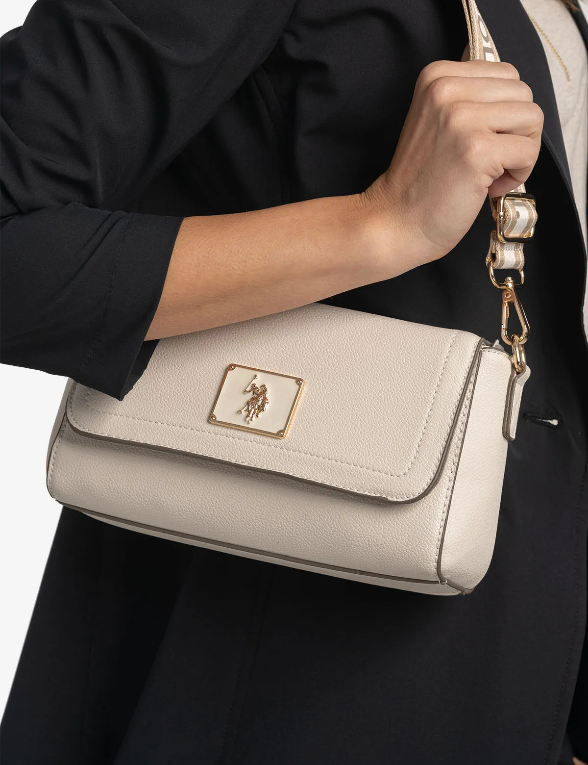 ENAMEL CROSSBODY BAG sold by U.S. Polo Assn.