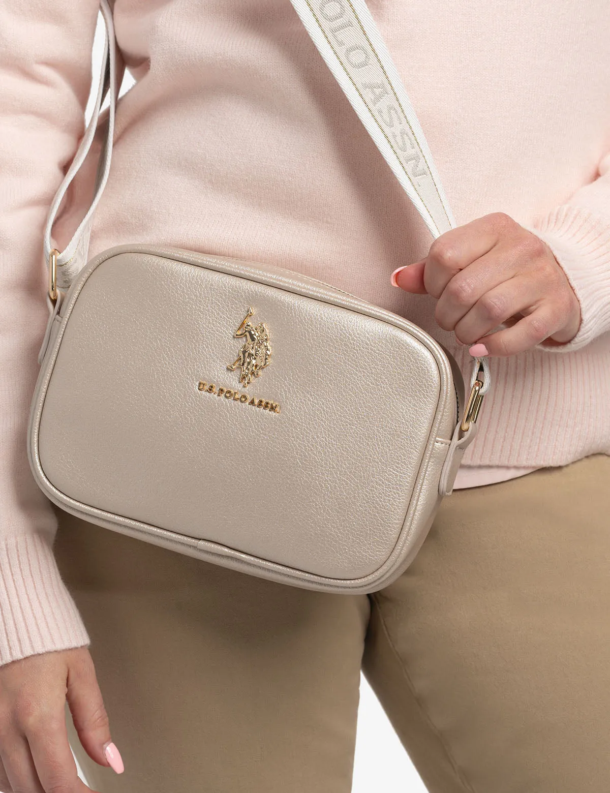 CLASSIC ZIP METALLIC CROSSBODY BAG sold by U.S. Polo Assn.